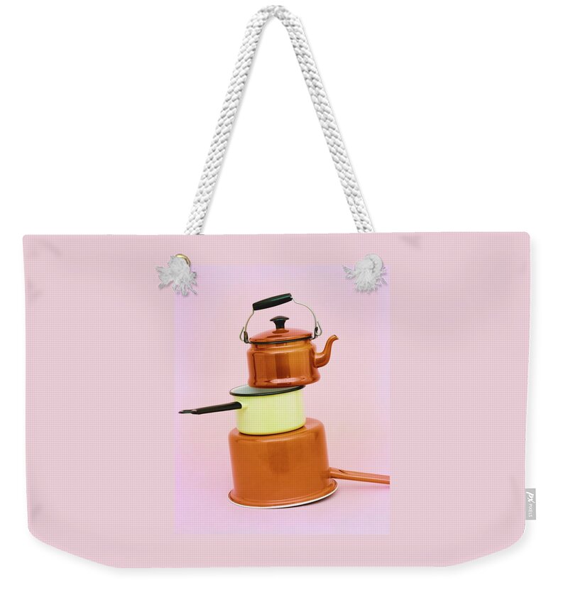 A Brass Teapot Stocked On Top Of Pots Weekender Tote Bag