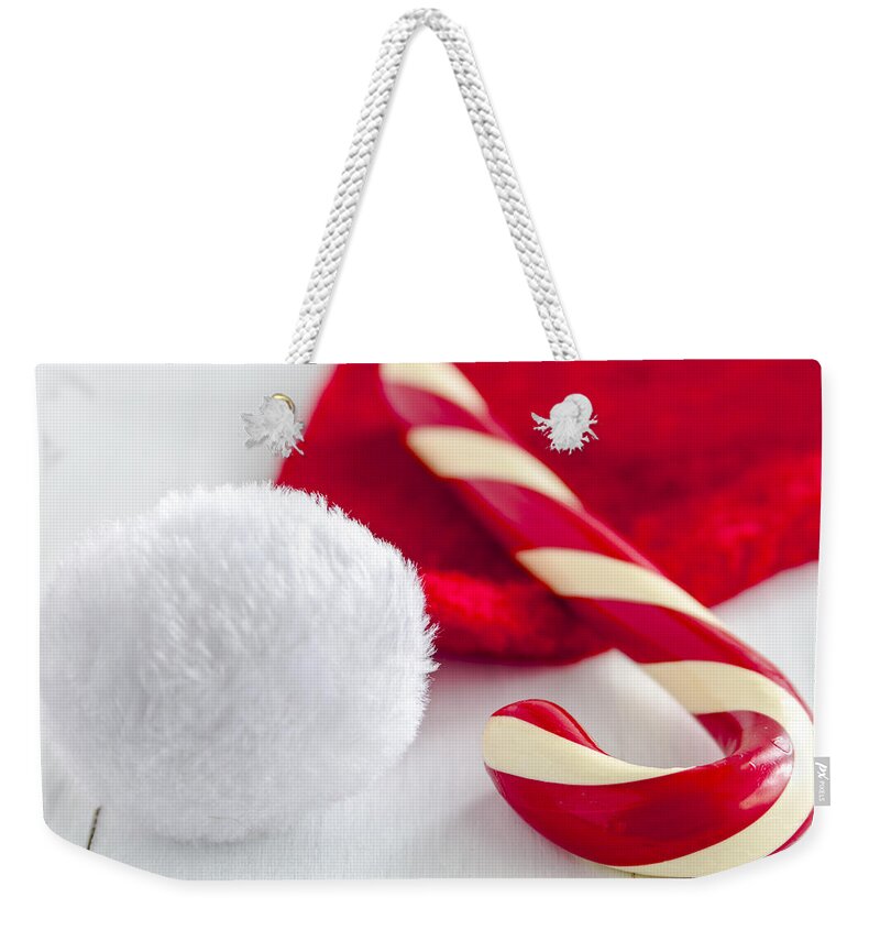 Candy Weekender Tote Bag featuring the photograph A Candy Cane for Santa by Teri Virbickis