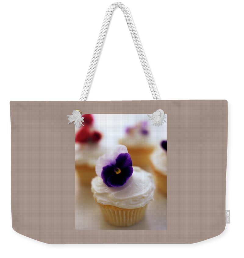 A Cupcake With A Violet On Top Weekender Tote Bag