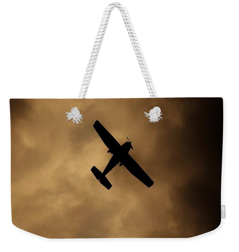 Airplane Weekender Tote Bag featuring the photograph A dance in the clouds by Jessica S