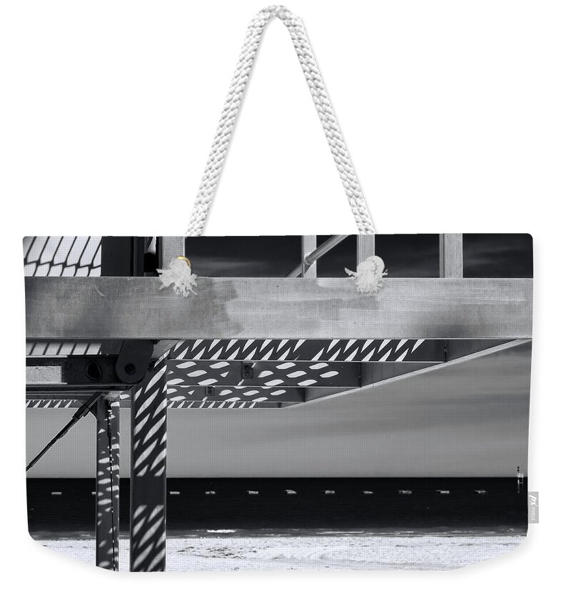 B+w Weekender Tote Bag featuring the photograph A Day At The Beach by Wayne Sherriff