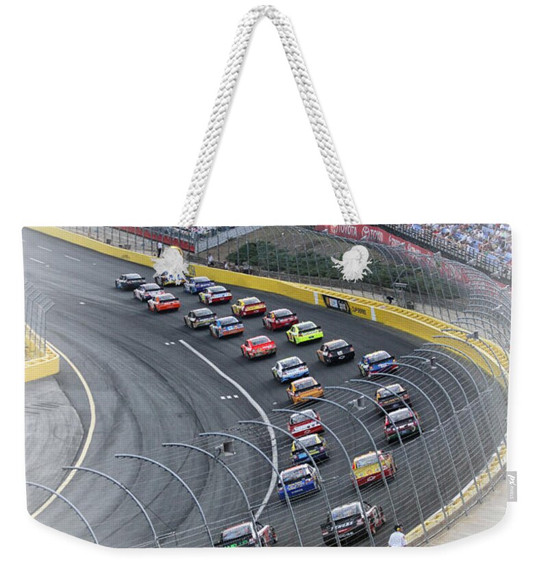 Racetrack Weekender Tote Bag featuring the photograph A Day at the Racetrack by Karol Livote