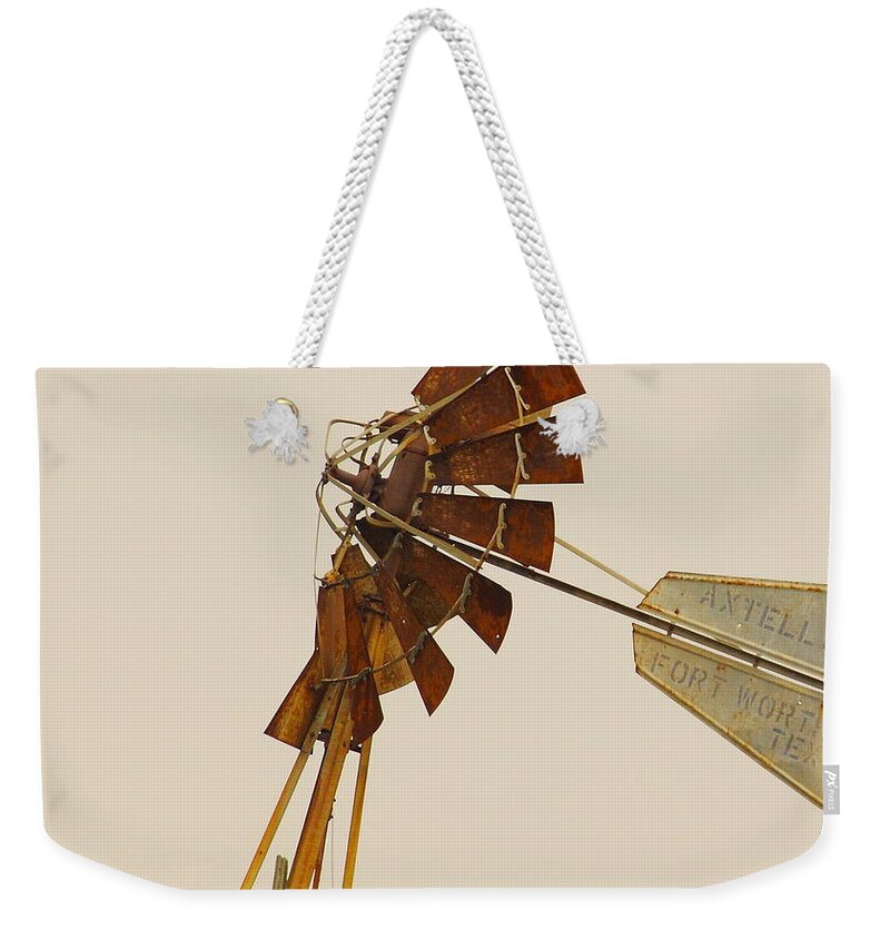 Olden Weekender Tote Bag featuring the photograph A Fierce Prairie Wind by Robert Frederick