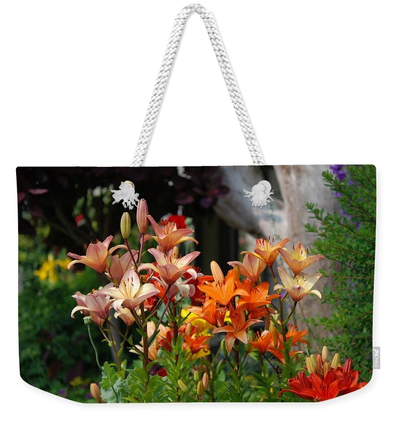 Lillies Weekender Tote Bag featuring the photograph A Garden of Lillys for Susan by Kathy Paynter