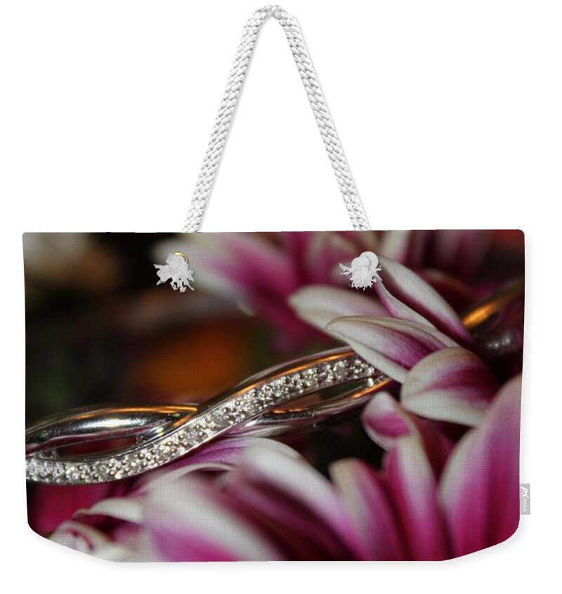 Diamonds Weekender Tote Bag featuring the photograph A gift amongst the flowers by Jennifer E Doll