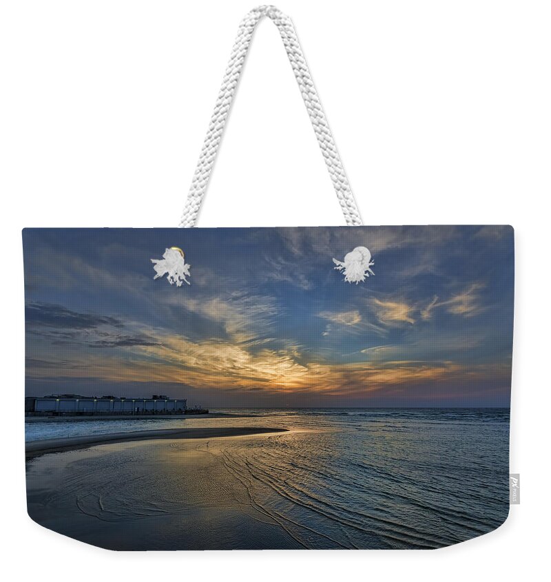 Israel Weekender Tote Bag featuring the photograph a joyful sunset at Tel Aviv port by Ron Shoshani