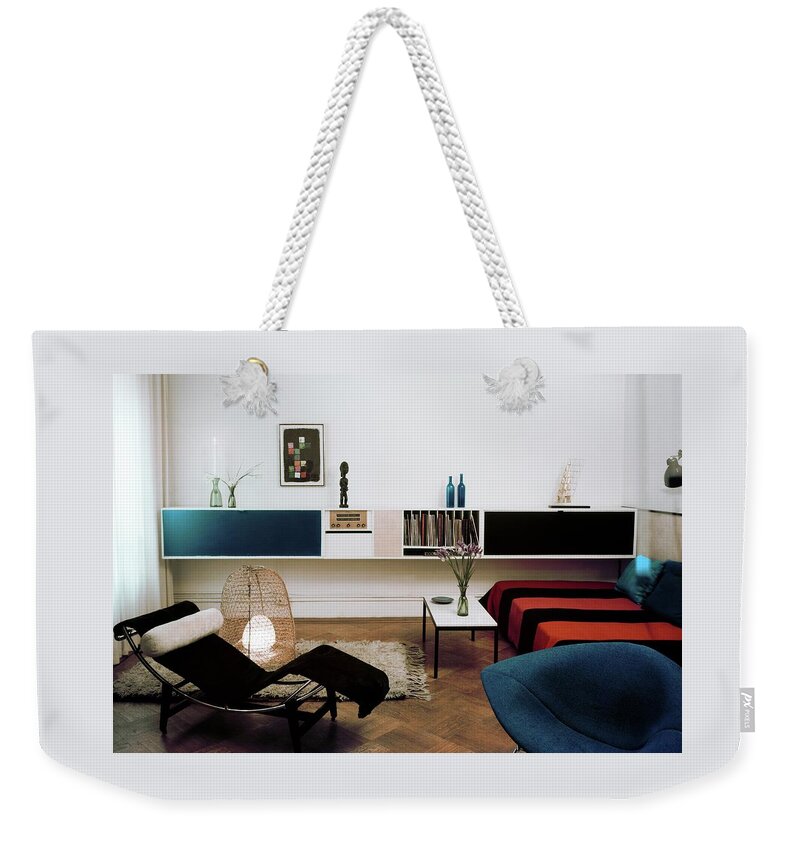 A Living Room With A Le Corbusier Chair Weekender Tote Bag
