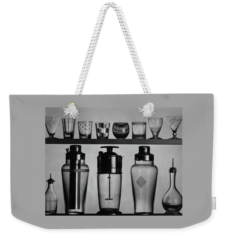 A Row Of Glasses On A Shelf Weekender Tote Bag