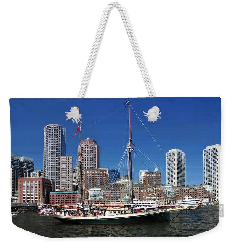 New England's Best Weekender Tote Bag featuring the photograph A Ship in Boston Harbor by Mitchell Grosky