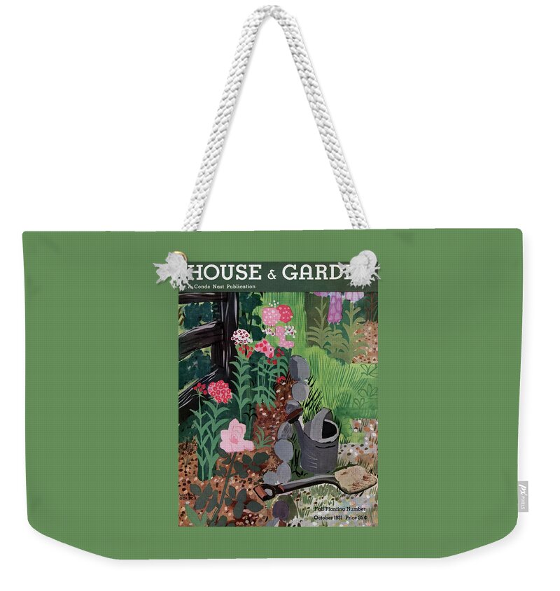 A Watering Can And A Shovel By A Flower Bed Weekender Tote Bag