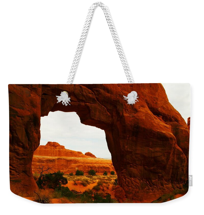 Arches Weekender Tote Bag featuring the photograph A Window With A View by Jeff Swan