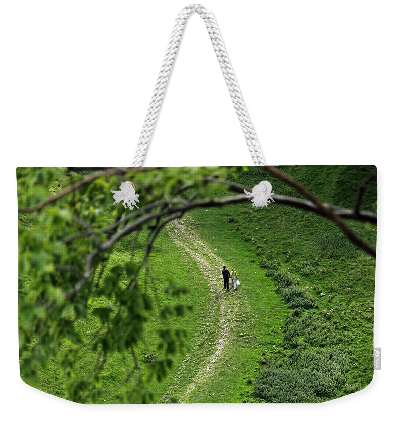 Britain Weekender Tote Bag featuring the photograph A Young Couple Walking In Cave Dale by Rod Johnson