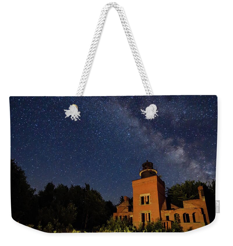 Built Structure Weekender Tote Bag featuring the photograph Abandoned Lighthouse With Milky Way by Jeff Ryan