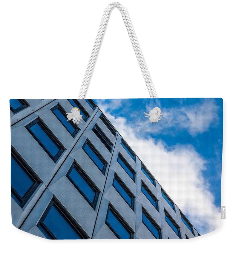 Blue Weekender Tote Bag featuring the photograph Abstract by Aleck Cartwright