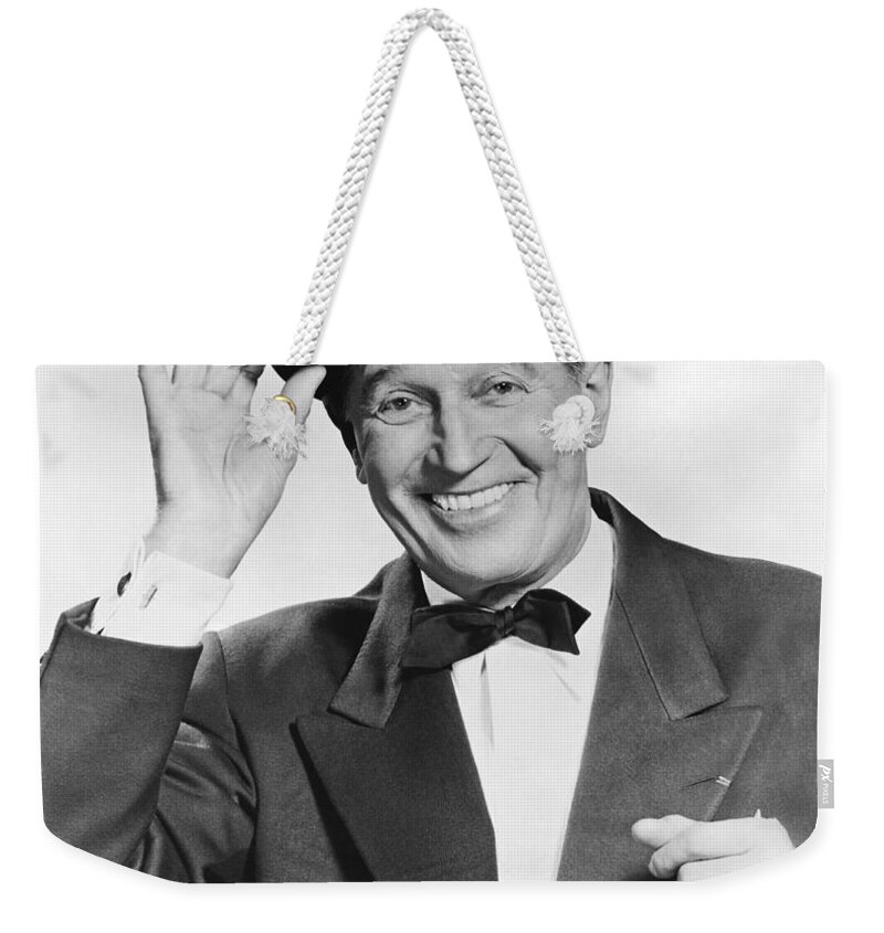 1035-1050 Weekender Tote Bag featuring the photograph Actor Maurice Chevalier by Underwood Archives