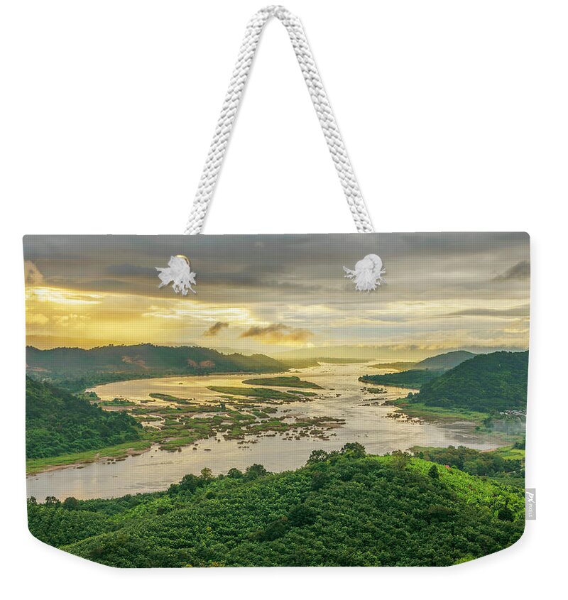 Tranquility Weekender Tote Bag featuring the photograph Aerial View Of Mekong River And Forest by Jakkreethampitakkull