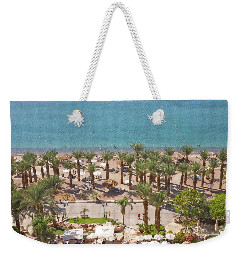 Tranquility Weekender Tote Bag featuring the photograph Aerial View Of Palms, Promenade And Red by Barry Winiker
