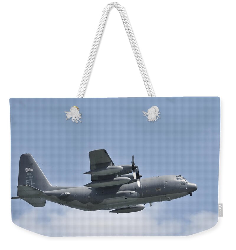 C-130 Weekender Tote Bag featuring the photograph AFRC C-130 Hercules rescue aircraft by Bradford Martin