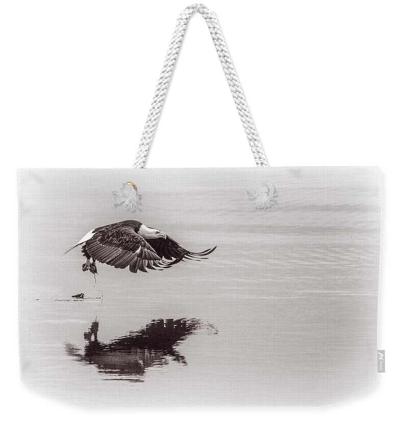 After The Catch Weekender Tote Bag featuring the photograph After The Catch by Wes and Dotty Weber
