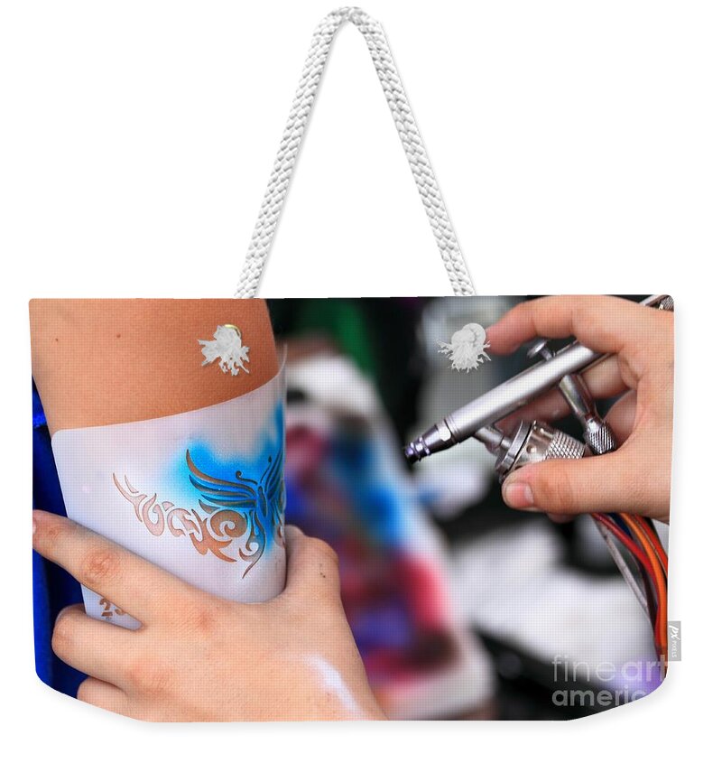 Body Weekender Tote Bag featuring the photograph Air Brush Tatoo by Henrik Lehnerer
