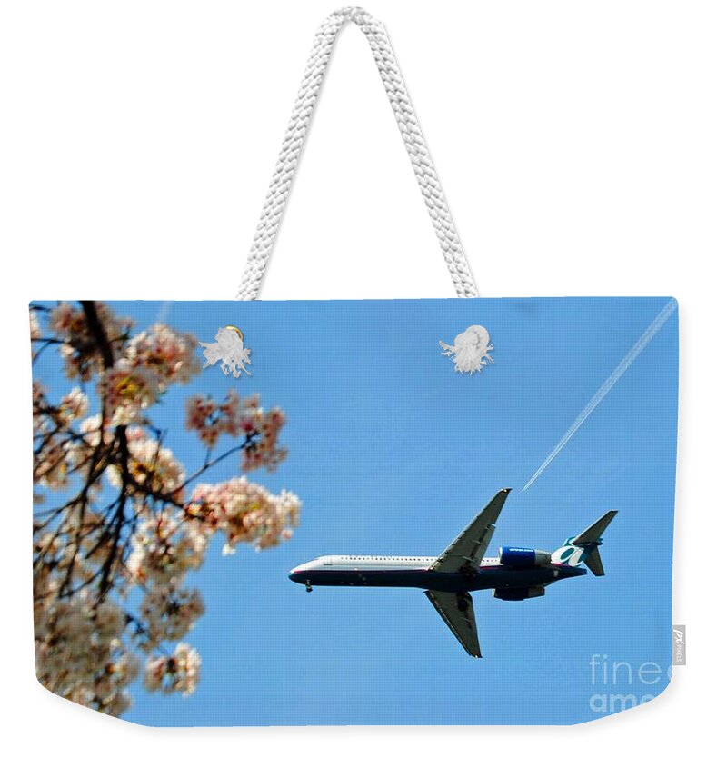 Tran Weekender Tote Bag featuring the photograph Air Tran Airlines by Jost Houk