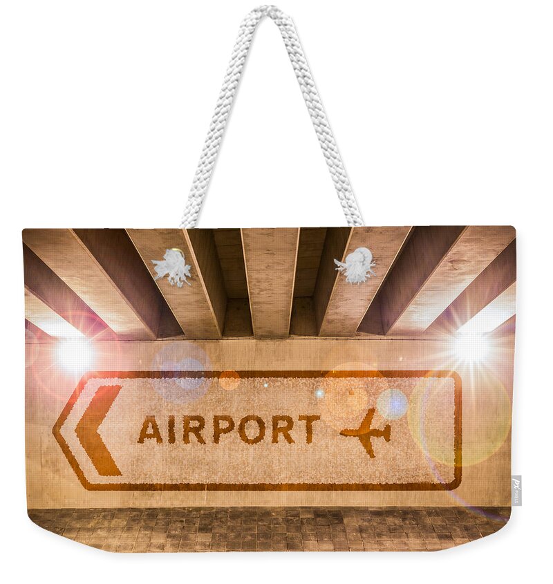 Arrow Weekender Tote Bag featuring the photograph Airport Directions by Semmick Photo