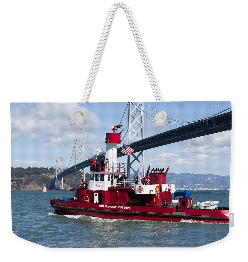 Americas Cup Weekender Tote Bag featuring the photograph Americas Cup SF Fire Department by Weir Here And There