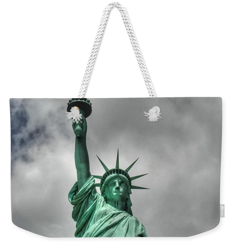 New York City Weekender Tote Bag featuring the photograph America's Lady Liberty by Tap On Photo