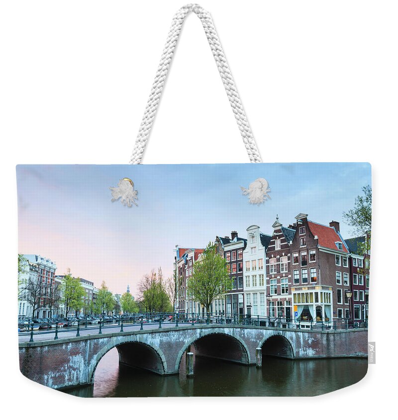 North Holland Weekender Tote Bag featuring the photograph Amsterdam At Dusk by Fraser Hall