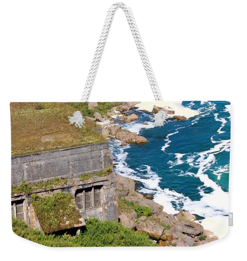  Hydroelectric Generating Station Weekender Tote Bag featuring the photograph An old hydroelectric generating station by Jennifer E Doll