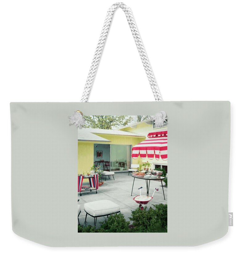 An Outside Area Set Up For A Party Weekender Tote Bag