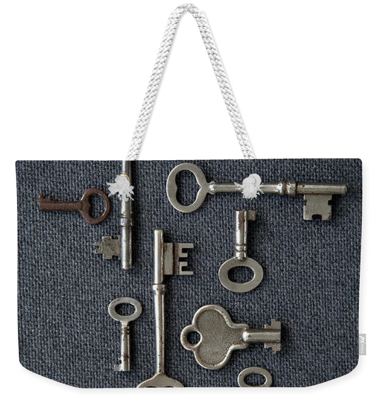 Security Weekender Tote Bag featuring the photograph Antique Skeleton Keys by Brad Wenner