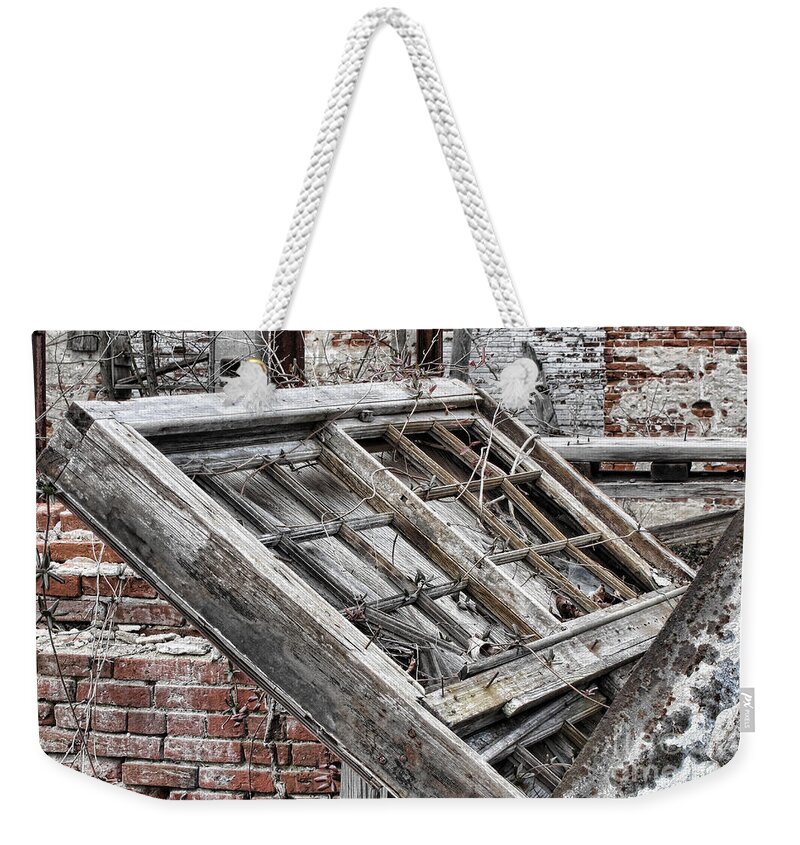 Abandoned Weekender Tote Bag featuring the photograph Antique Wood Window by Olivier Le Queinec