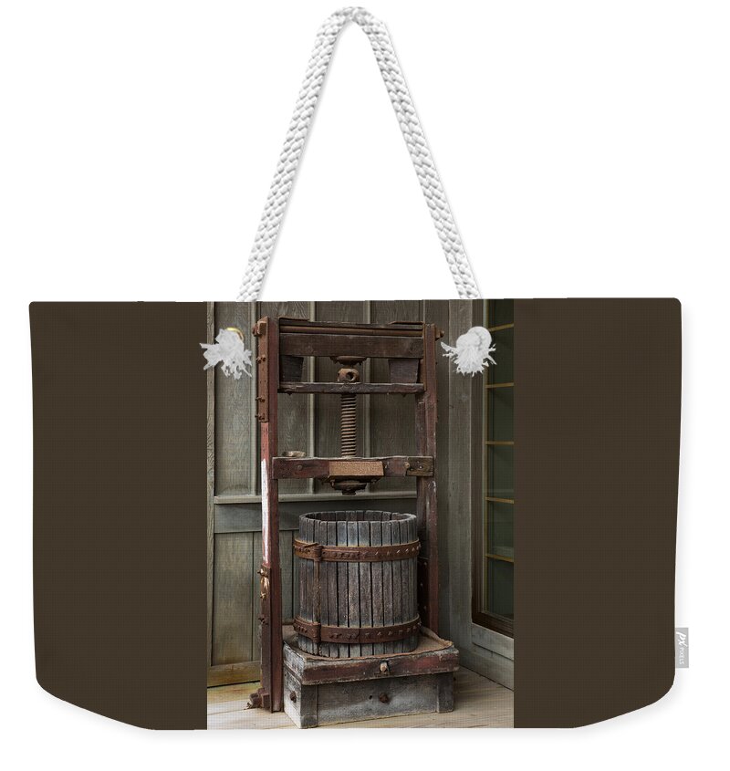 Apple Press Weekender Tote Bag featuring the photograph Apple Press by Dale Kincaid
