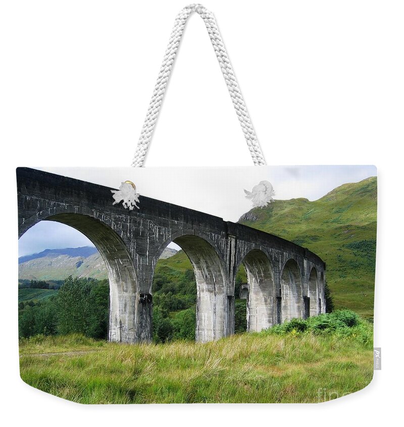 Scottish Highlands Weekender Tote Bag featuring the photograph Arched Highlands by Denise Railey