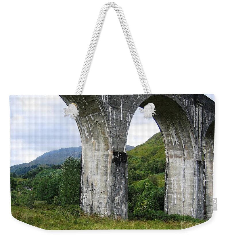 Scottish Highlands Weekender Tote Bag featuring the photograph Arches and Sky by Denise Railey