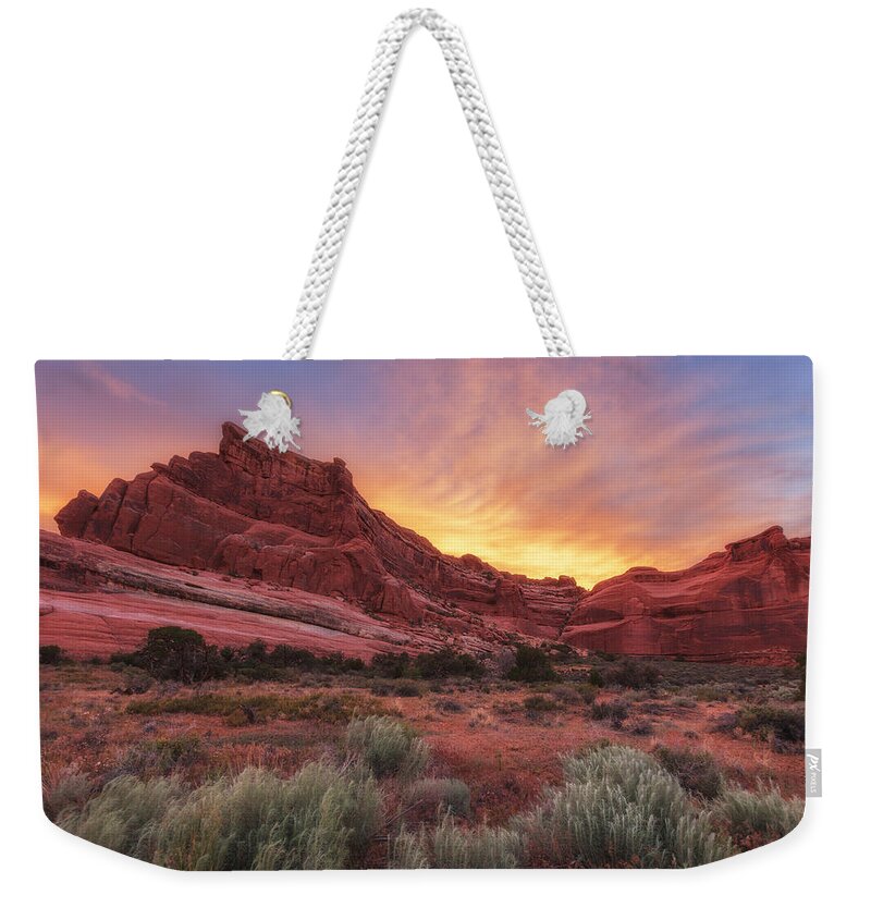 Sunset Weekender Tote Bag featuring the photograph Arches Fire in the Sky by Darren White