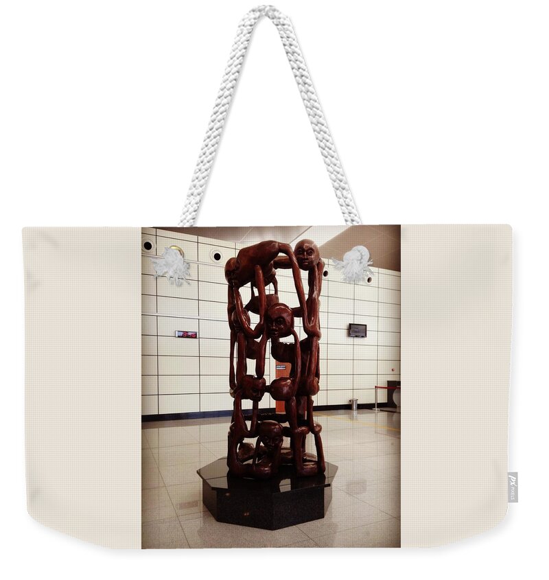 Maputo Weekender Tote Bag featuring the photograph Art at the Airport by Zinvolle Art