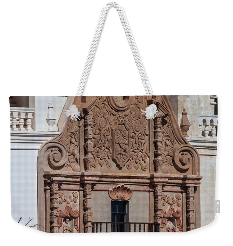 San Xavier Del Bac Weekender Tote Bag featuring the photograph Artwork at San Xavier del Bac by Ed Gleichman