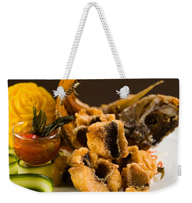 Asian Weekender Tote Bag featuring the photograph Asian Fried Snapper by Raul Rodriguez