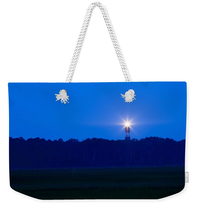Sparse Weekender Tote Bag featuring the photograph Assateague Lighthouse at dawn by Kyle Lee