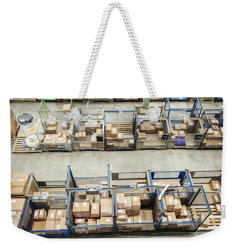 Pallet Weekender Tote Bag featuring the photograph Assembled Orders In Distribution by Arno Masse