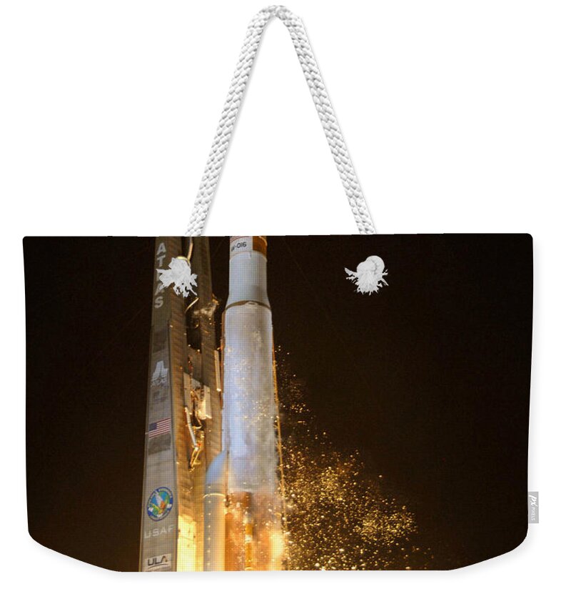 Astronomy Weekender Tote Bag featuring the photograph Atlas V Rocket Taking Off by Science Source