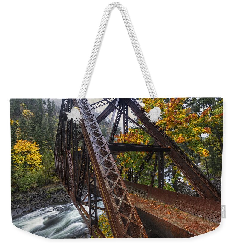 October Weekender Tote Bag featuring the photograph Autumn and Iron by Mark Kiver