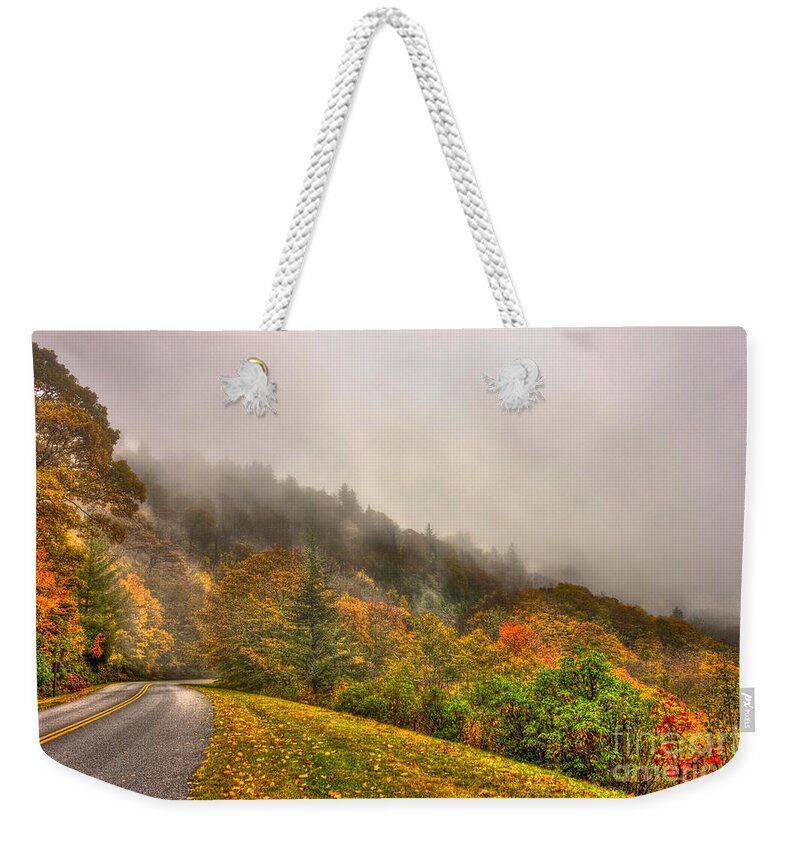 Reid Callaway Blue Ridge Parkway Weekender Tote Bag featuring the photograph Autumn Just Around The Bend Blue Ridge Parkway in NC by Reid Callaway