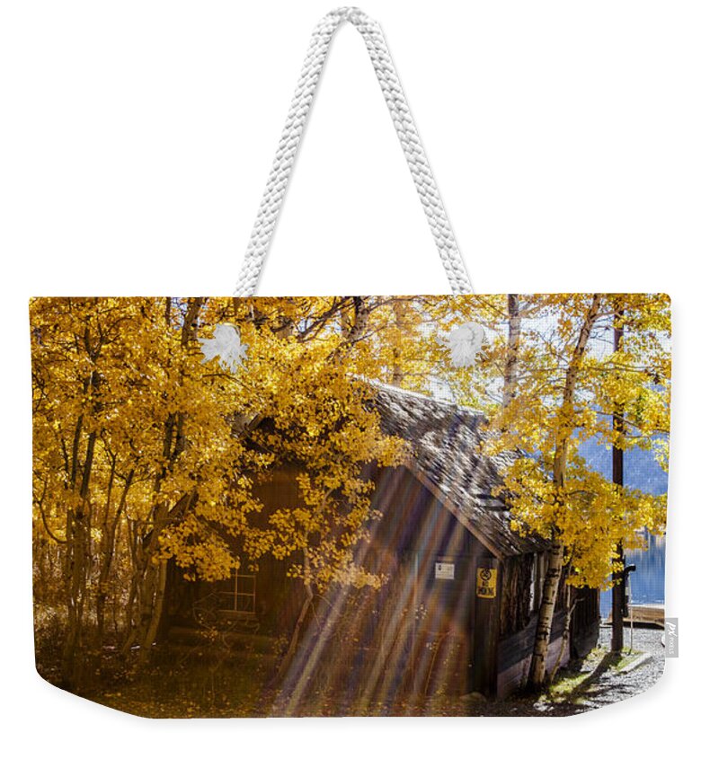 Boat House Weekender Tote Bag featuring the photograph Autumn Sun Rays on Boat House Fine Art Photograph Print by Jerry Cowart