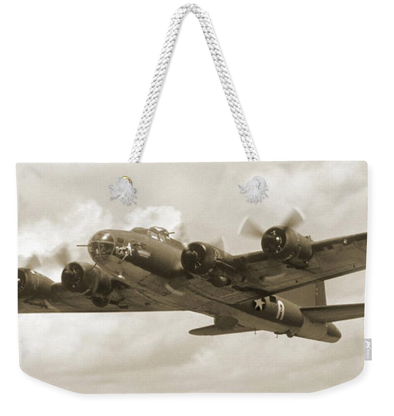 Warbirds Weekender Tote Bag featuring the photograph B-17 Flying Fortress by Mike McGlothlen