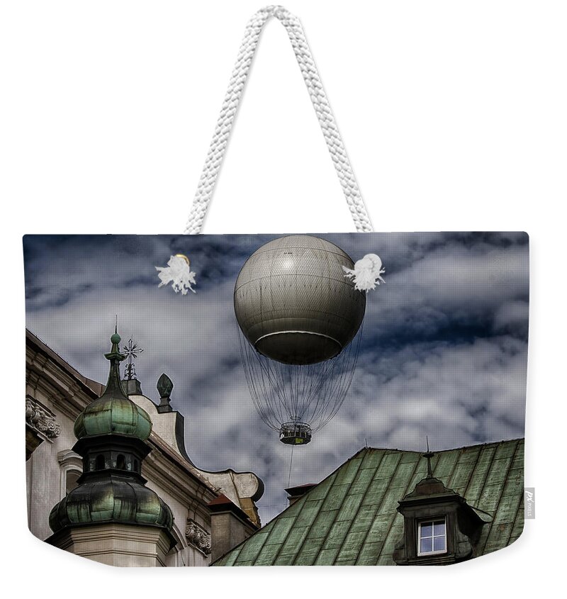 Balloon Weekender Tote Bag featuring the photograph Balloon Over Krakow by Robert Woodward