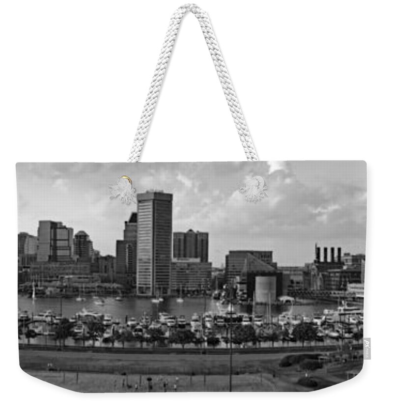Baltimore Skyline Weekender Tote Bag featuring the photograph Baltimore Harbor Skyline Panorama BW by Susan Candelario