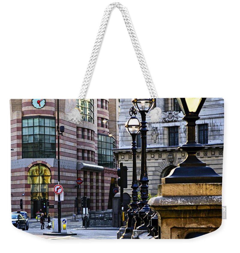 London Weekender Tote Bag featuring the photograph Bank station in London by Elena Elisseeva